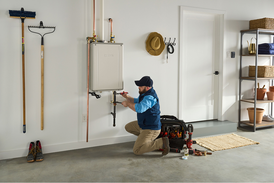 Installer working on Noritz tankless water heater